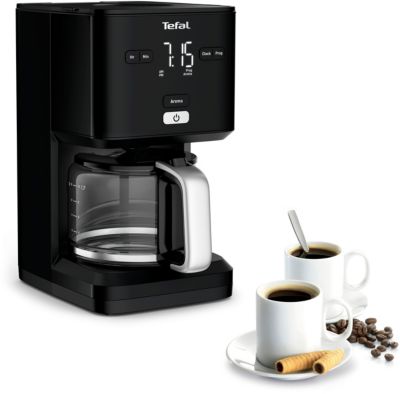 café moulu dans le porte-filtre, machine à café, gros plan