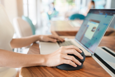 woman hand using computer ergonomic mouse, prevention wrist pain because working long time. De Quervain s tenosynovitis, Intersection Symptom, Carpal Tunnel Syndrome or Office syndrome concept