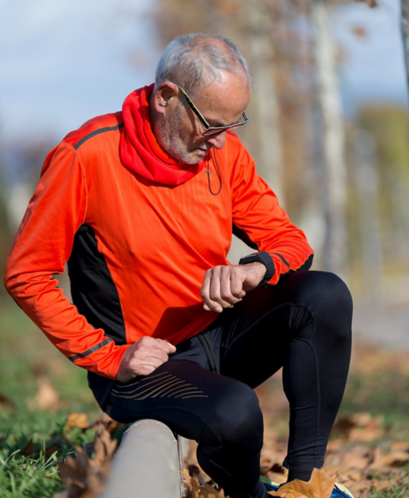 Senior man setting up the smart watch
