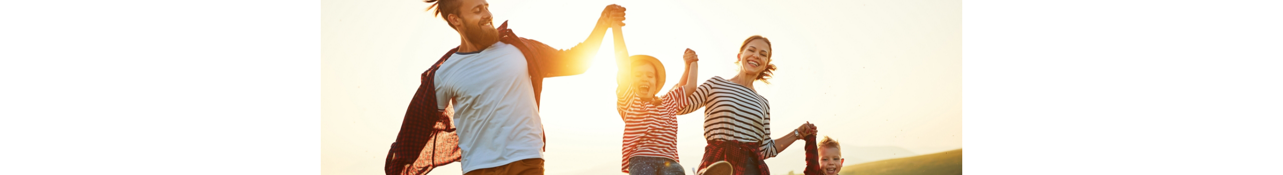 Happy family: mother, father, children son and daughter on nature on sunset