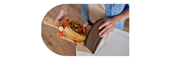 jeter les Déchets dans un composteur de cuisine