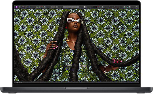 Une image photographique colorée d’une personne souligne l’éclat de l’écran XDR du MacBook Pro.