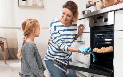 Happy family: mother, father, children son and daughter on nature on sunset